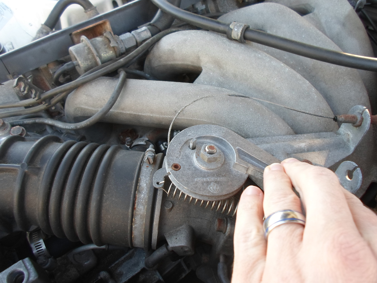 Removing throttle cable from throttle wheel